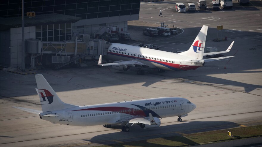 Malaysia Airlines planes sit on the tarmac last year at the Kuala Lumpur International Airport in Sepang, Malaysia.