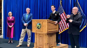 Gov. Eric Holcomb, second from left, and other officials give updates on the state's COVID-19 response.