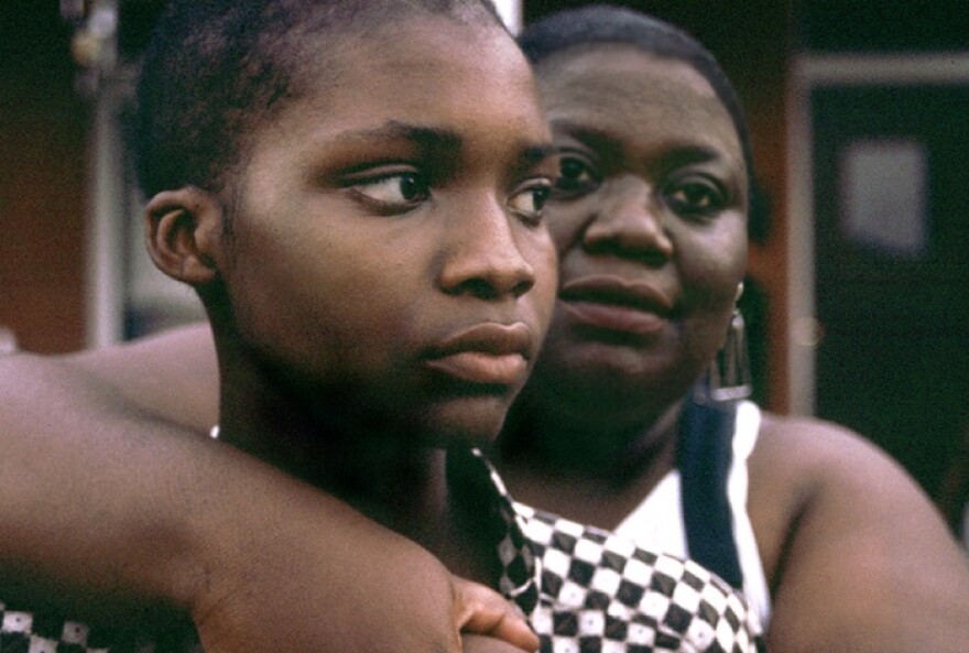 Tim Woods, with his mother Marietha, was one of five cancer patients featured in PBS' "A Lion In The House" in 2006.