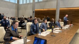 Holly Dodge, left, sits next to Acting Deputy Chief Stacey Graves before the start of Tuesday's Kansas City Board of Police Commissioners meeting.
