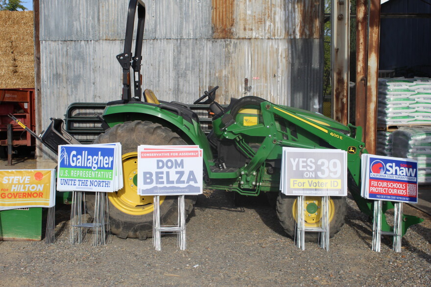 Signs at a campaign event for Republican Congressman James Gallagher and Dom Belza on Oct. 29, 2026 in Red Bluff, Calif.