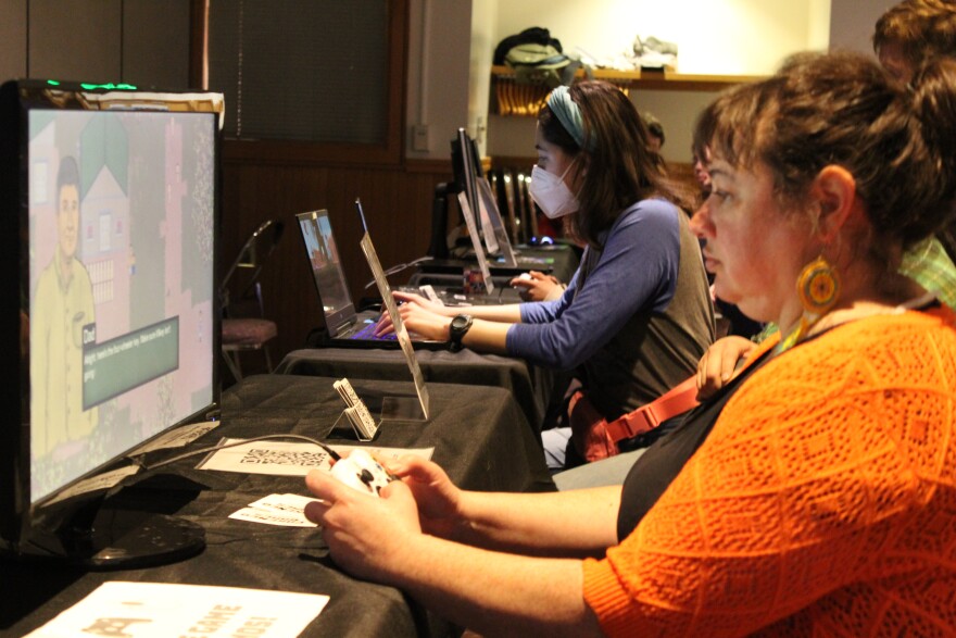 Community members play games at the first game development expo in Bethel.