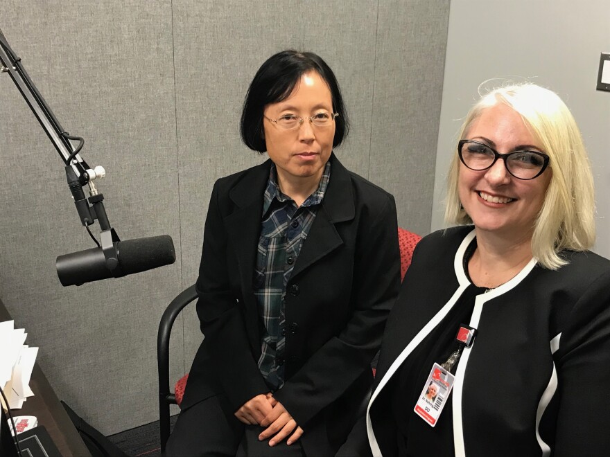 Dr. Xiuzhen Haung, founder and director of the Translational Research Lab (l) and Dr. Sara Nehring of St. Bernards Medical Center is co-director of the lab (r).  