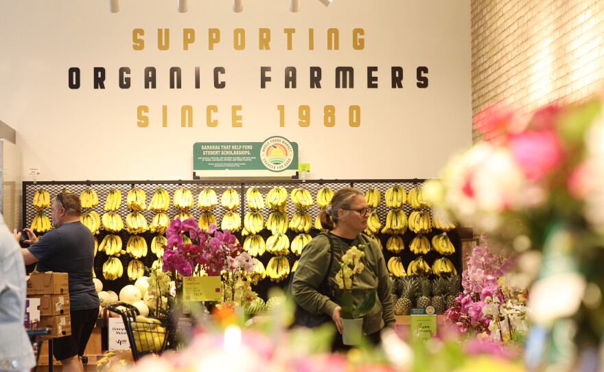 Shoppers flock to the opening of the Whole Foods in Brighton on Wednesday, April 12, 2023.