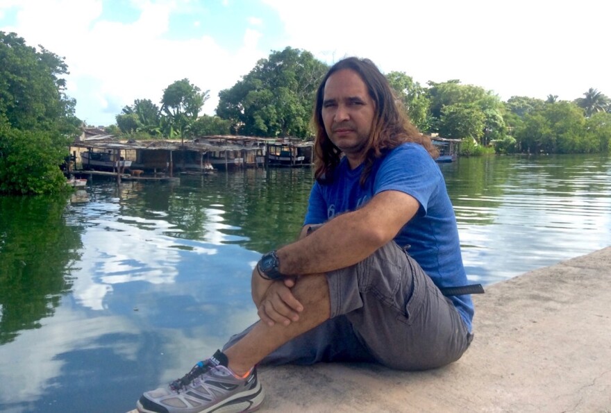 Rey Alfonso's wife Patricia took this 2015 photo of him when he returned to the river in Matanzas Cuba where he built his last boat.