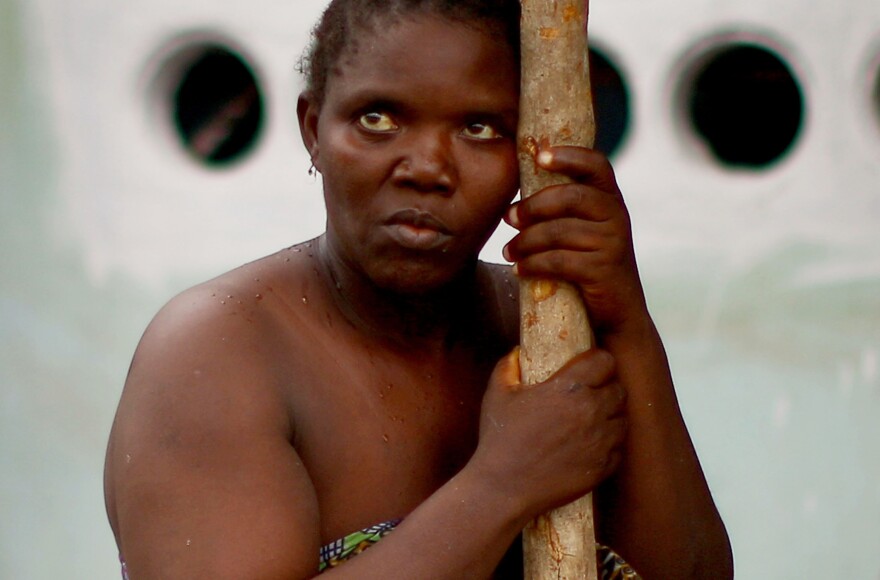 Baby Sesay, a traditional healer in Sierra Leone, treated a child who later died, apparently of Ebola, and then became sick herself and went to a care center. <em>From the story "<a href="http://www.npr.org/sections/goatsandsoda/2014/11/20/365284178/an-npr-photographer-looks-ebola-in-the-eye" target="_blank">An NPR Photographer Looks Ebola In The Eye</a>," 2014.</em>