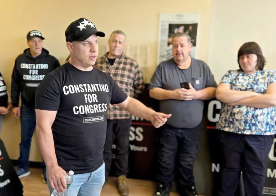 Sticker Mule CEO Anthony Constantino, a Republican, speaks to supporters at his campaign's Plattsburgh headquarters earlier this month.