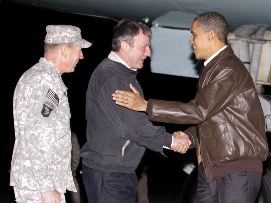 L-R: Gen. David Petraeus, Amb. Karl Eikenberry and President Obama as the commander-in-chief arrived in Afghanistan today.