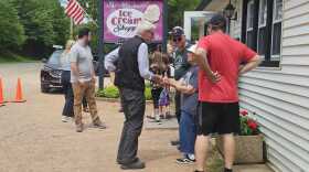 Gov. Evers meets with the Berg family at the Windmill Ice Cream Shoppe in Tomahawk as part of his tour during June Dairy Month.
