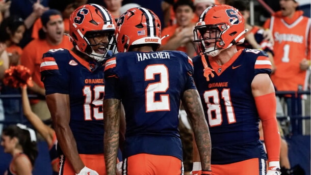 Syracuse’s pass catchers (Blue) celebrate a touchdown during its 23-21 loss to California Saturday.