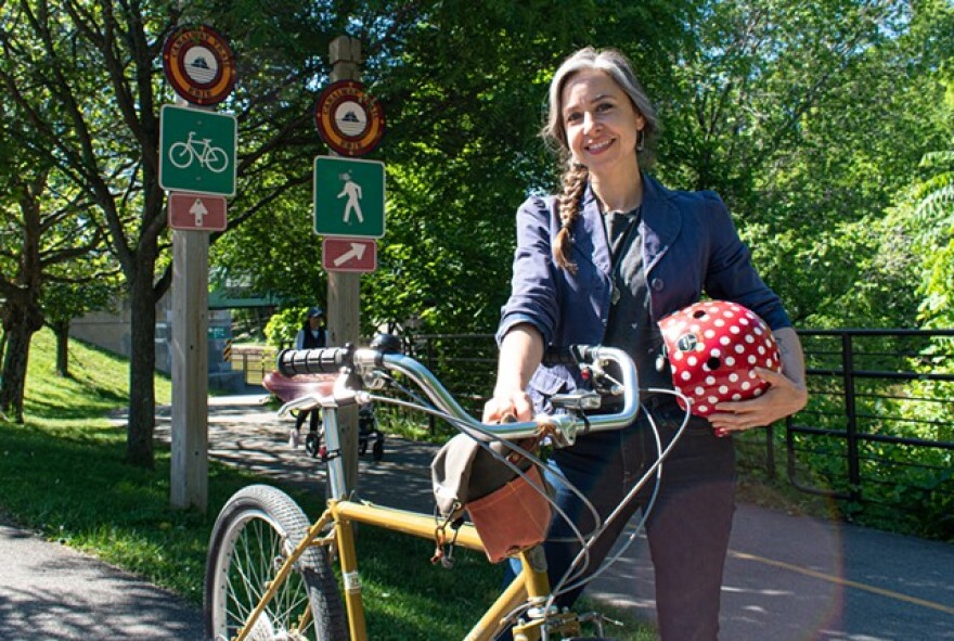 Brooke Fossey of Pittsford said cycling gives her a sense of freedom, and she hopes that when people see Reconnect Rochester's 20 Minutes by Bike maps they are moved to try riding their bikes for short trips.