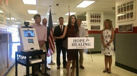 First Lady Casey DeSantis demonstrates how the telehealth portals work at a press conference in Panama City on Thursday, Aug. 8, 2019. 