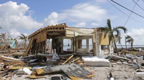 Debris surrounds a destroyed structure in the aftermath of Hurricane Irma 