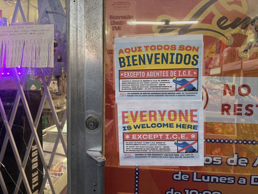 A sign outside Lempira Tienda Latina welcomes everyone except ICE.