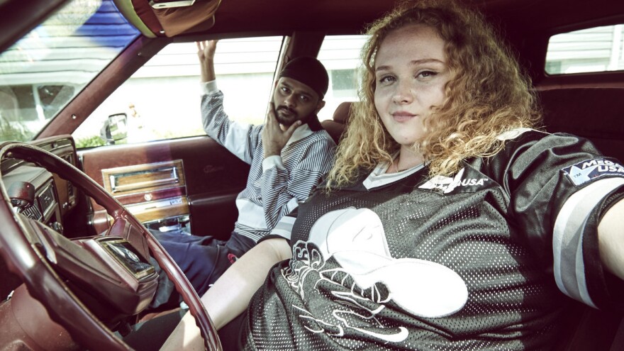 L to R: Jheri (Siddharth Dhananjay) and Patti (Danielle Macdonald) on the road to success in <em>Patti Cake$. </em>