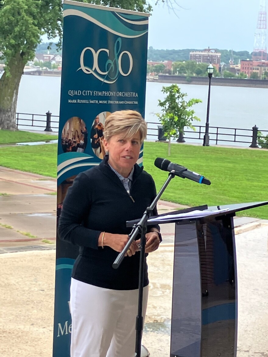 Laura "Divot" Ekizian, Quad City Bank & Trust president and CEO, speaks at a press conference Wednesday, Aug. 5, 2026 at LeClaire Park, Davenport.