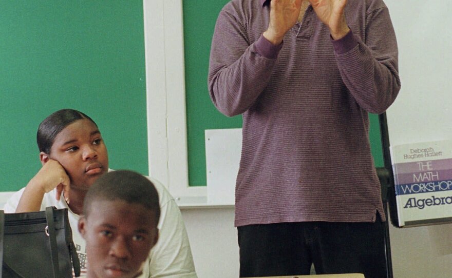 Moses teaches an algebra class at Lanier High School in Jackson, Miss., in 1990.