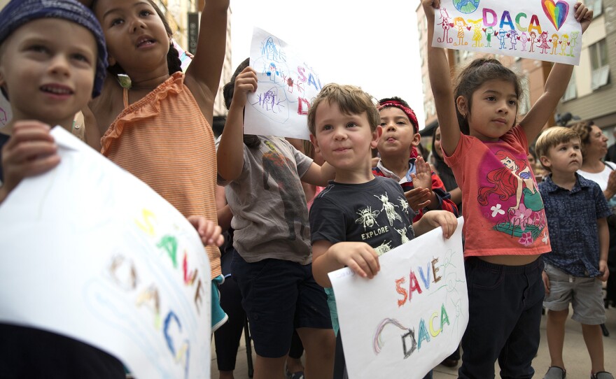 Students from the Jose Marti Child Development Center gather during a community rally in support of DACA recipients on Tuesday, September 5, 2017, at El Centro De La Raza in Seattle. 