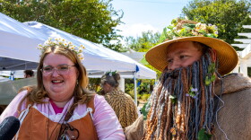 Couple being interviewed at the Hobbit day celebration. Photo by Alexander Brown.