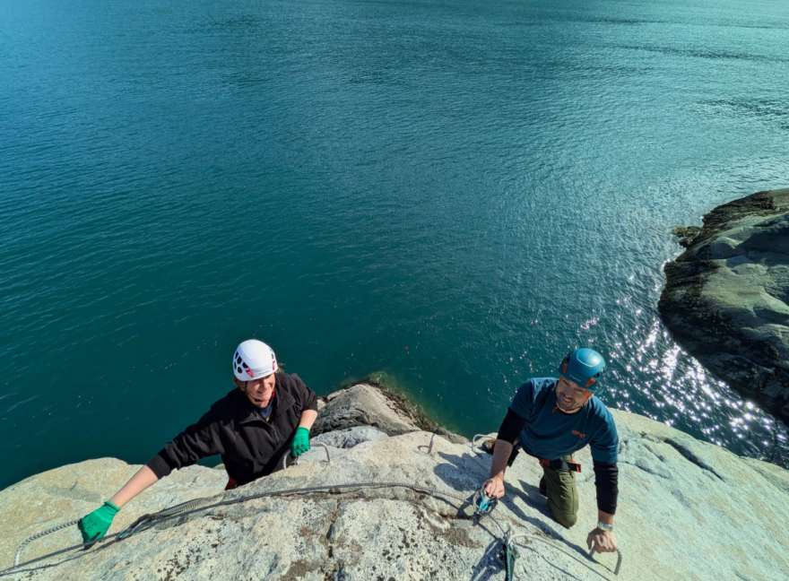 Kiara Hylton and Rahsaan Gregg make their way across one of three climbing routes at the Halutu Sky walk, a via ferrata tour set to launch next year in Haines.