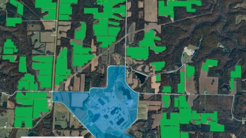 An aerial map of the Callaway County nuclear power plant. The area with nuclear infrastructure is shaded blue. Clusters of the map around the plant are shaded green, showing where solar panels would be built. 
