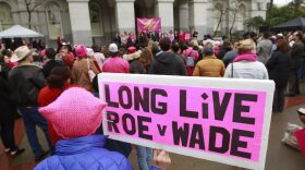 A sign is shown supporting Roe v. Wade at a rally, held by Planned Parenthood, commemorating the 45th anniversary of the landmark Supreme Court decision at the Capitol Monday, Jan. 22, 2018, in Sacramento, California. (AP Photo/Rich Pedroncelli)