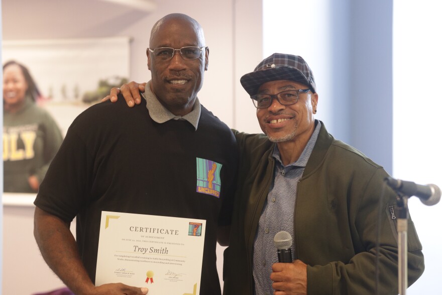 Troy Smith (left) stands next to Tommy "Shakur" Ross. Troy was part of the Uncuffed Re-Entry Audio Storytelling class for formerly incarcerated people.