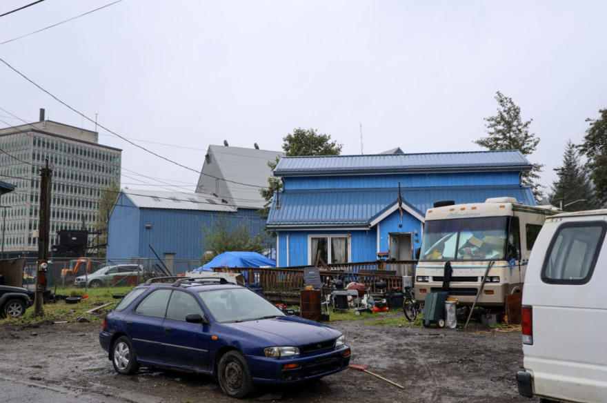 Vehicles sit parked outside a home on Village Street that the city and tribe cleaned up last week. Wednesday, Sept. 16, 2026.