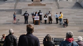 A crowd attends a rally as part of the 2021 Missouri Voting Rights Lobby Day at the state Capitol in Jefferson City, Mo., on March 31. The Republican-led House approved a bill that would impose strict photo ID and other requirements on voting.