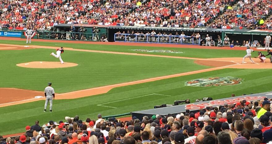 Carlos Carrasco pitching during Indians 2017 home opener. [Matt Richmond / ideastream]