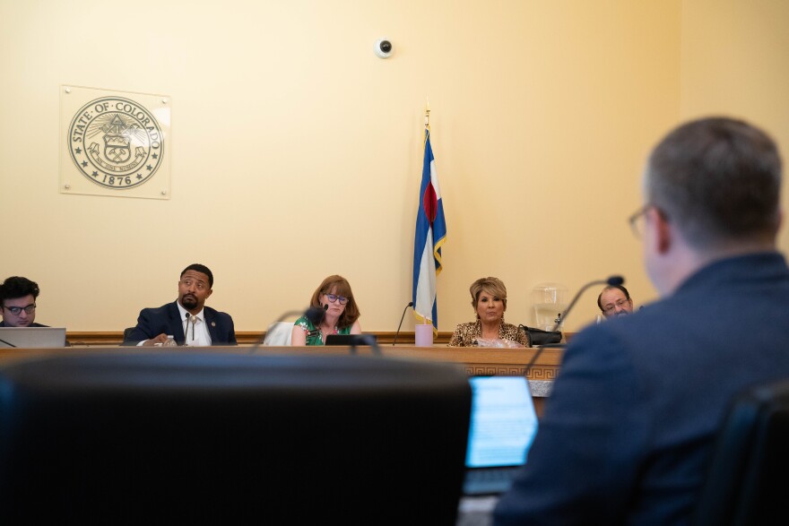 Top state lawmakers listen as Mark Ferrandino, director of the Governor's Office of State Planning and Budgeting, speaks about the state budget at the Colorado Capitol in Denver on Wednesday, July 30, 2025.