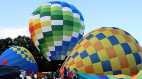 Balloons getting inflated ahead of the opening flight at the Suncook Valley Rotary's 44th annual hot air balloon rally July 31, 2026.