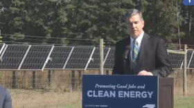 Gov. Roy Cooper spoke in Cary just before signing an executive order to fight climate change. 