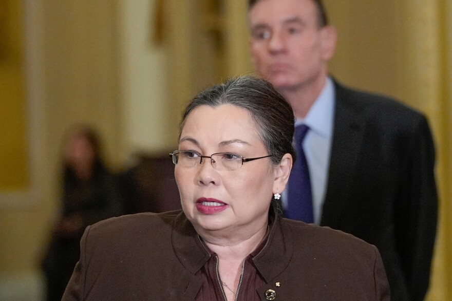 Closeup of U.S. Sen. Tammy Duckworth speaking at a news conference at the U.S. Capitol.