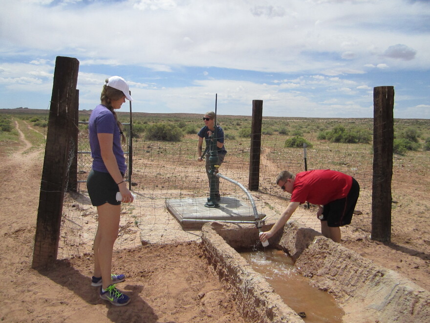 Ingram's students investigate a water source on the Navajo Nation.
