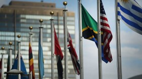 The American flag flies with other nations' flags outside the United Nations in New York City. (Spencer Platt/Getty Images)