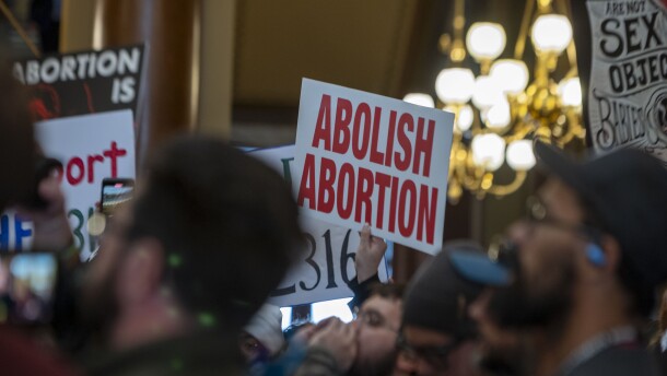 A group of anti-abortion rights protester called on lawmakers to put restrictions on abortion pills sent by mail at the Iowa Capitol Feb. 9, 2026.