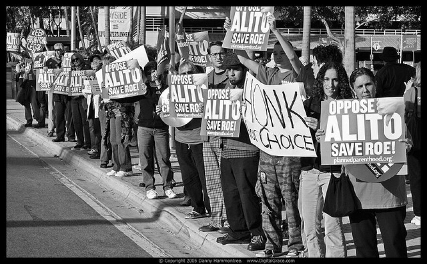 A crowd od protesters in Miami rallies against the confirmation of Judge Samuel Alito, who opposes abortion.