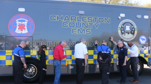 Charleston County leaders and emergency workers bless the area's new mass casualty incident bus which was unveiled Friday in North Charleston. March 20, 2026