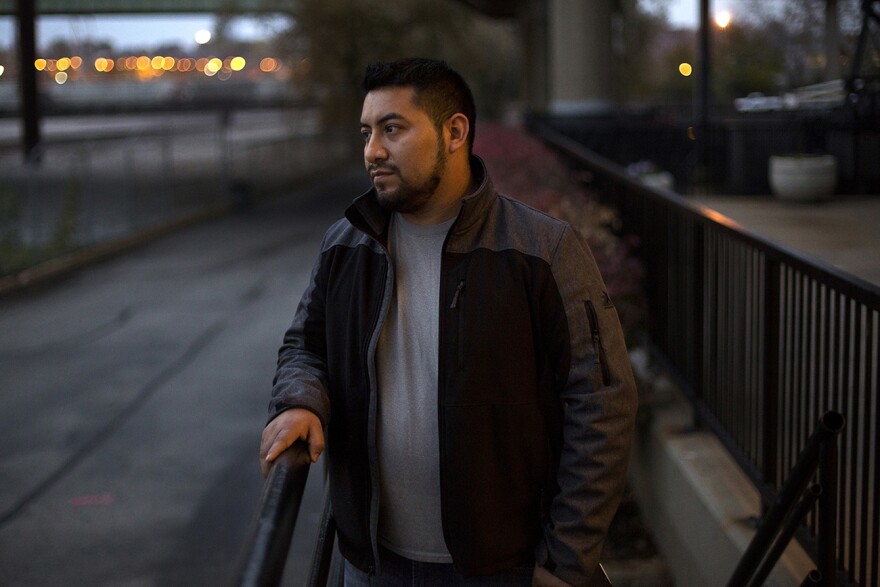 Garcia poses for a portrait in downtown St. Louis after a check-in for an ICE supervision program. Nov. 17, 2017