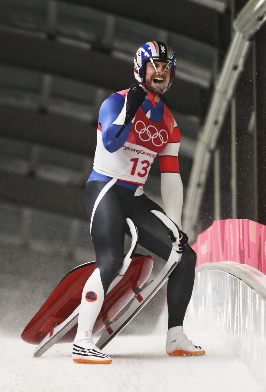 Chris Mazdzer celebrates his silver following run 4 on Sunday in Pyeongchang, South Korea. His performance marks the first time an American has earned an Olympic medal in the men's singles luge.