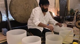 Sound healing practitioner Ronnie Brown prepares for session in Lexington