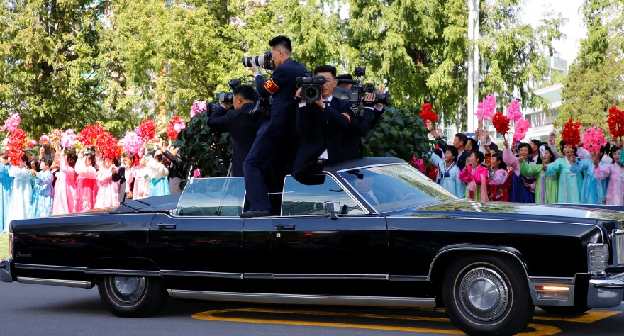 Photographers and cameramen from North Korean media document the motorcade of South Korean President Moon Jae-in and North Korean leader Kim Jong Un as it travels through Pyongyang, North Korea.