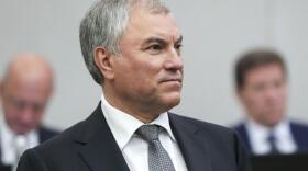 a man in a suit and tie