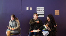 People wait to attend a citizenship workshop in Seattle.