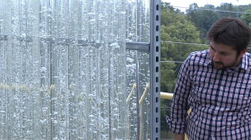 The algae photo-bioreactor converts algae into bio-fertilizer using campus greenhouse gas emissions.