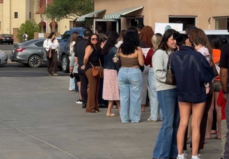 Dozens lined up outside of Creation Coffe & Co on 4th Avenue in Yuma, Arizona.