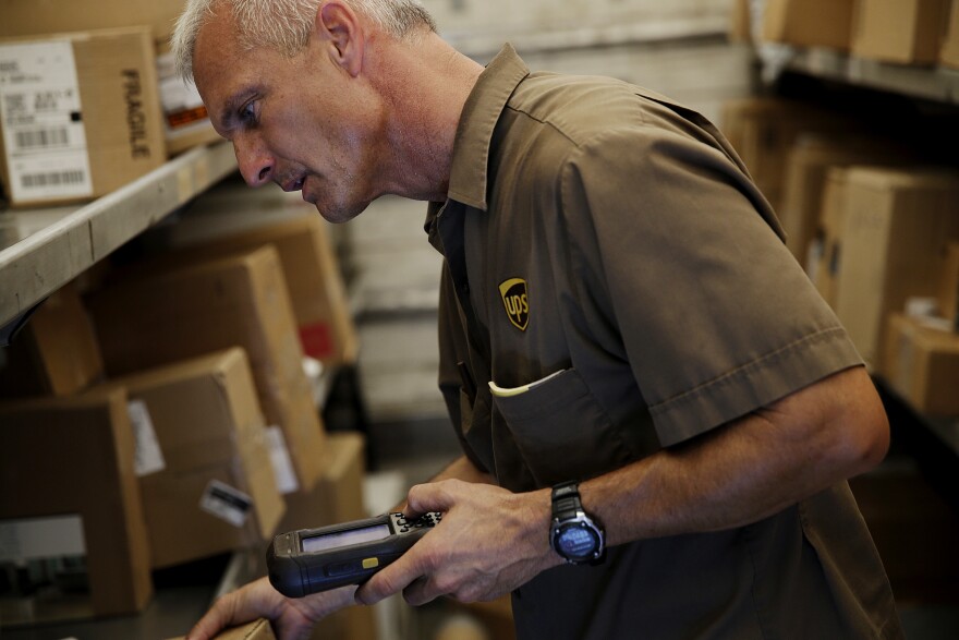 Rewarding customers when they choose slower shipping options is one way online retailers are reacting to a recent decision by UPS to add a holiday surcharge during peak delivery days.