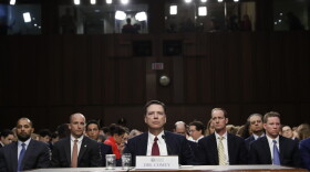 Former FBI Director James Comey listens to the committee chairman at the beginning of the Senate Intelligence Committee hearing on Capitol Hill, Thursday, June 8, 2017, in Washington. (Alex Brandon/AP)