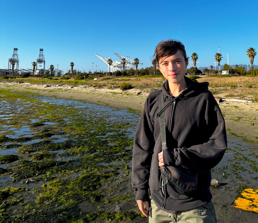 Maria BC standing in front of the port cranes at Middle Harbor Park. 